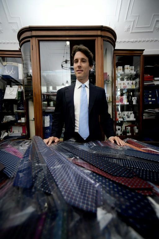 In Naples, the tiny shop near the sea remains much as it was when it opened in 1914, with its wood-framed windows, chandelier, and counter where the red, blue, polka dot or diamond-patterned ties are displayed