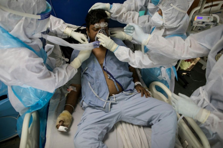 India's health system is in danger of being overwhelmed by the coronavirus, which the Red Cross said was spreading across south Asia "at an alarming rate"