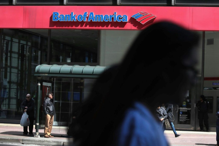 Bank Of America reported a drop in earnings due to large reserves for bad loans, offset somewhat by strong trading results