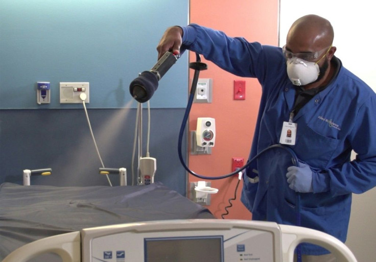 A technician applies an anti-microbial coating developed by Allied BioScience's first generation antimicrobial coating