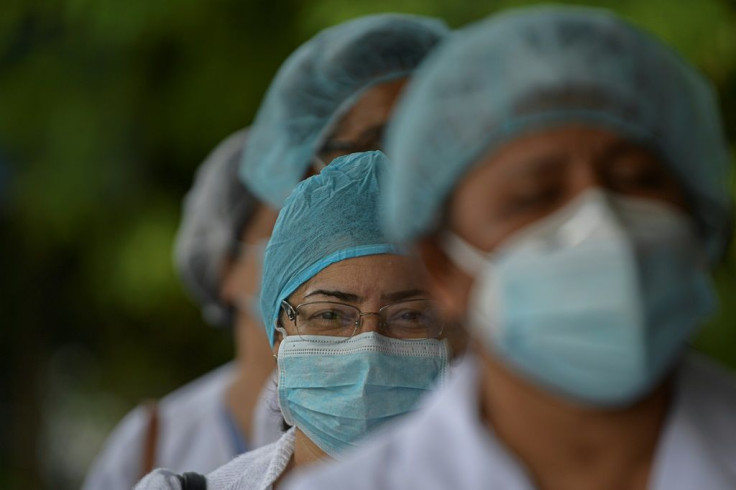 Health workers protest for lack of medical supplies at the Dr Arnulfo Arias Madrid hospital complex in Panama City, on July 16, 2020, as Panama exceeds 50,000 cases of COVID-19