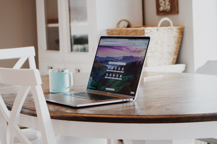 macbook-on-brown-wooden-table-4200831