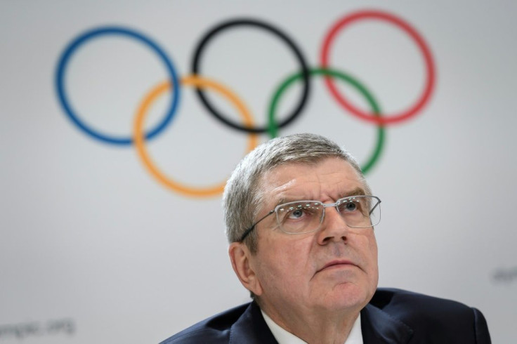 Thomas Bach admits there is no 'solution' at this point to the challenges posed by coronavirus to the postponed Tokyo Olympics
