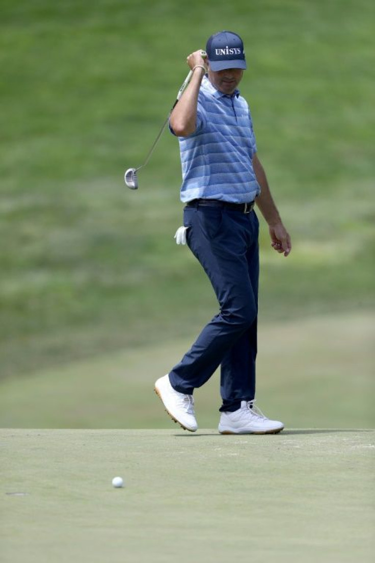 American Ryan Palmer reacts to a missed birdie putt on the 18th green in the second round of the US PGA Tour Memorial tournament