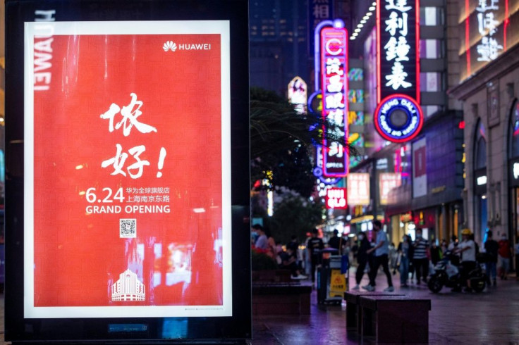 A billboard in Shanghai in June 2020 advertises a global flagship store of Huawei, the Chinese telecom giant which the United States is seeking to counter