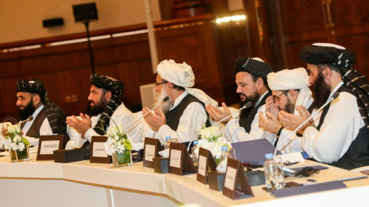 A Taliban delegation (pictured) met with a group of powerful Afghans including political figures in Doha in 2019 amid separate talks with the US seeking to end the long-running conflict