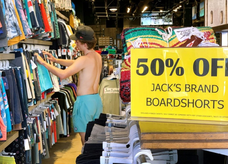 A man shops in a California surf store without a mask on July 16, 2020, disregarding a state mask-wearing mandate