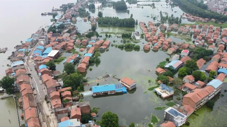 Homes along the mighty Yangtze River in China are turned into waterways as the worst flooding in decades collapses flood defenses. Vast swathes of China have been inundated by the deluge, caused by heavy rains since June.