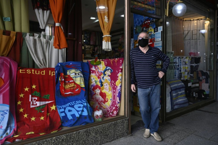 A salesman waits for customers at his store after lockdown measures to fight the coronavirus pandemic were relaxed in Buenos Aires