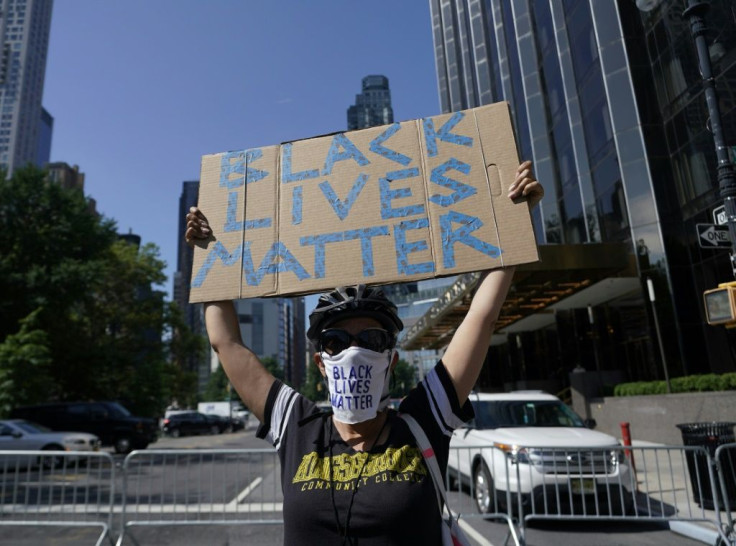 Demonstrators take part in the "Strike for Black Lives" protest in front of Trump International Hotel & Tower in New York City