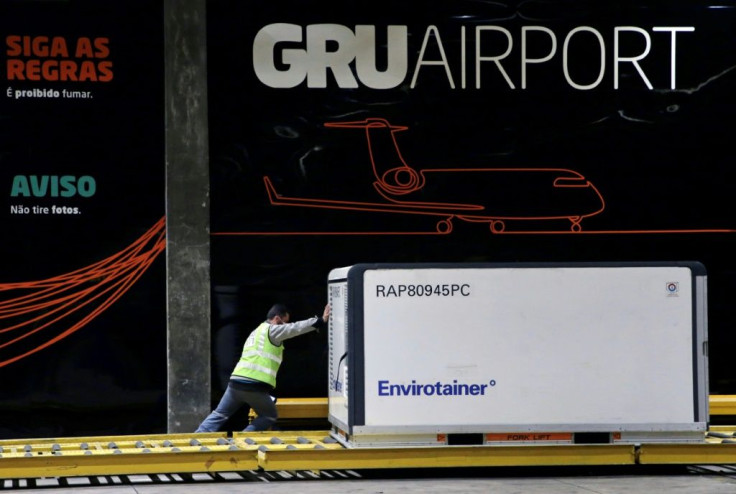 A jandout picture released by the Sao Paulo State Government shows the cargo shipment of COVID-19 vaccines produced by the Chinese company Sinovac Biotech being dispatched at the Cumbica airport, in Guarulhos, Sao Paulo state, Brazil