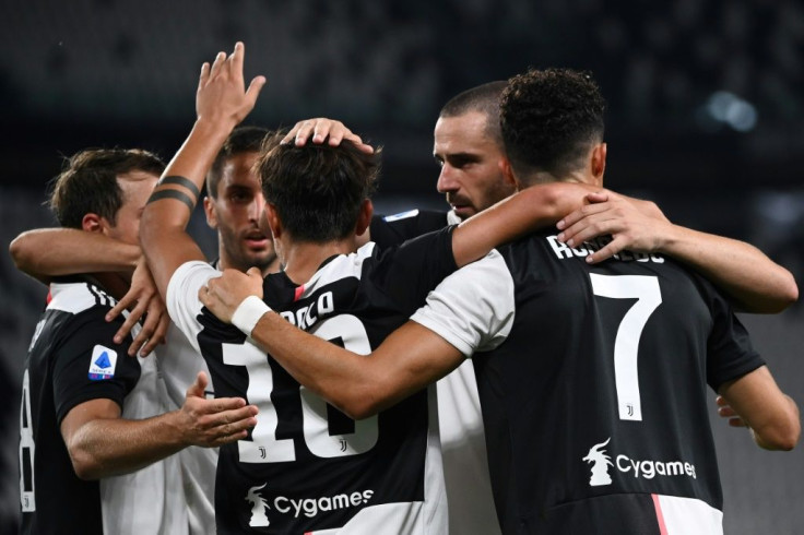 Juventus forward Cristiano Ronaldo celebrates with teammates after scoring a goal against Lazio in Turin.