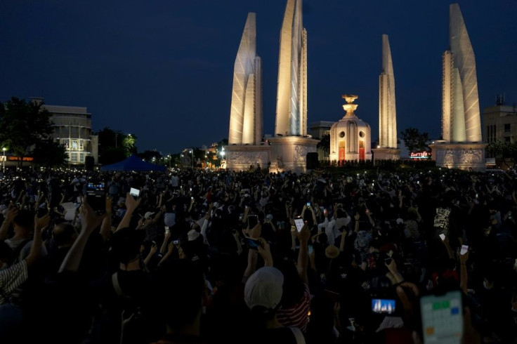 Thousands of mostly young, black-clad protesters amassed at Bangkok's Democracy Monument in one of the city's largest shows of defiance in years