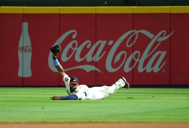 Coca-Cola's second-quarter results were dented by lost sales from pro sports and other live events