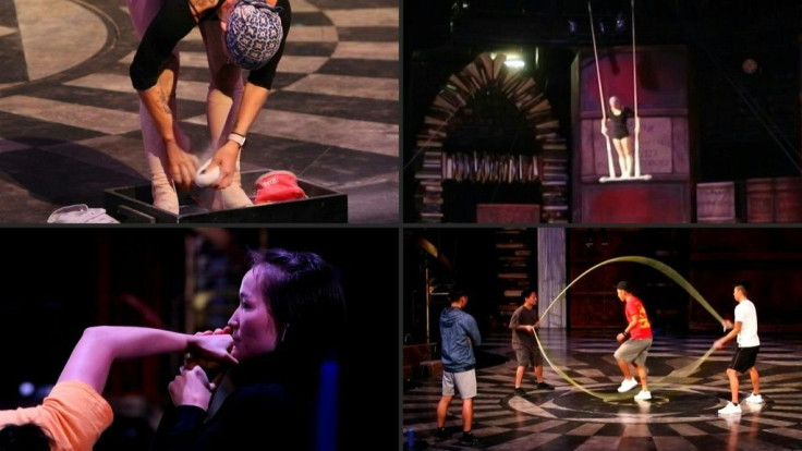 Cirque de Soleil artists wear face masks, use hand sanitizer and maintain social distancing guidelines as they practise for the 'Joya' show in Mexico