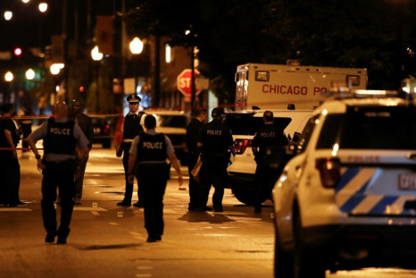 Fourteen people were wounded in the shootout outside a funeral parlor in Chicago