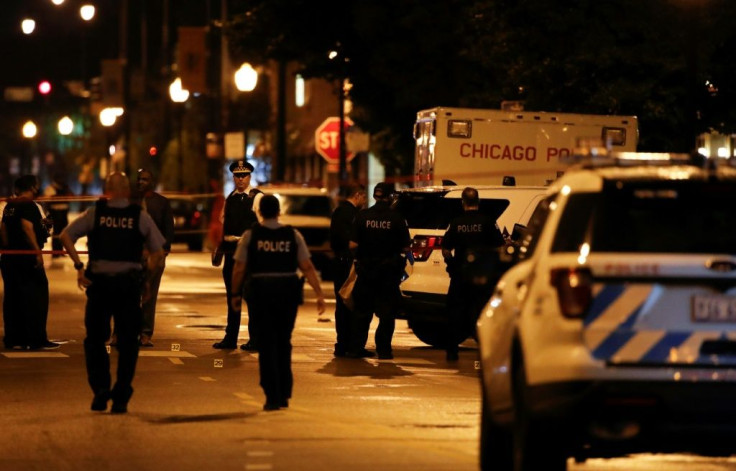 Fourteen people were wounded in the shootout outside a funeral parlor in Chicago