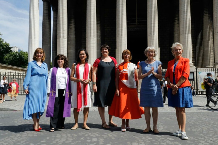 From left: Helene Pichon, Christina Moreira, Loan Rocher, Marie-Automne Thepot, Sylvaine Landrivon, Anne Soupa and Laurence de Bourbon Parme at the Madeleine church in Paris on Wednesday.