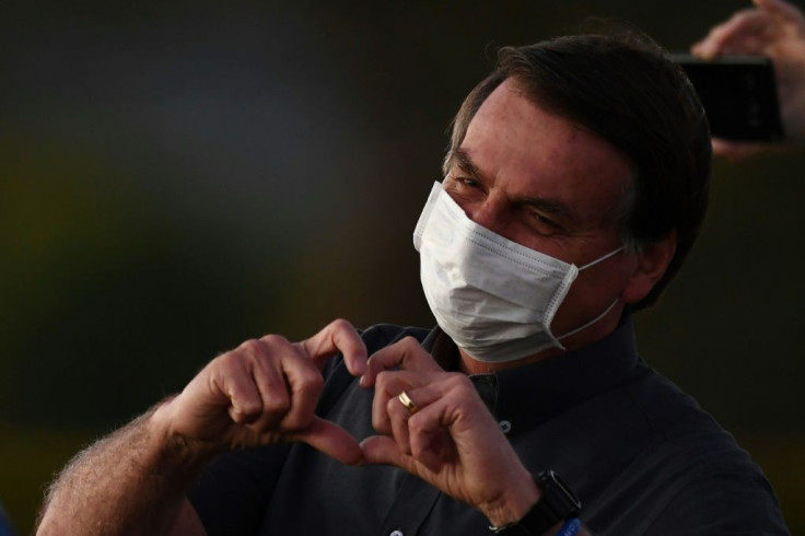 Until he was infected, Brazilian President Jair Bolsonaro regularly hit the streets of Brasilia without a face mask, exchanging hugs and handshakes with supporters