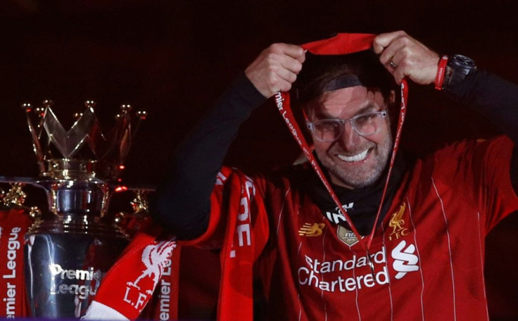Liverpool manager Jurgen Klopp receives his Premier League winner's medal