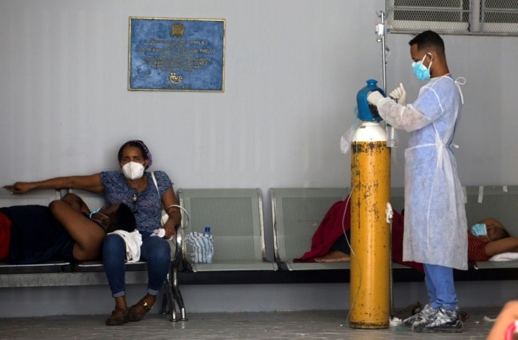 People receive medical attention in the COVID-19 ward of the Moscoso Puello Hospital in Santo Domingo