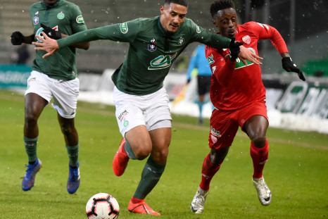 Saint-Etienne's French forward William Saliba (L) vies with Dijon's French-Togolese defender Arnold Bouka Moutou (R) 