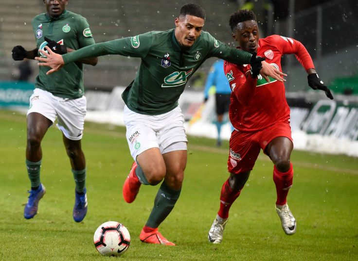 Saint-Etienne's French forward William Saliba (L) vies with Dijon's French-Togolese defender Arnold Bouka Moutou (R) 