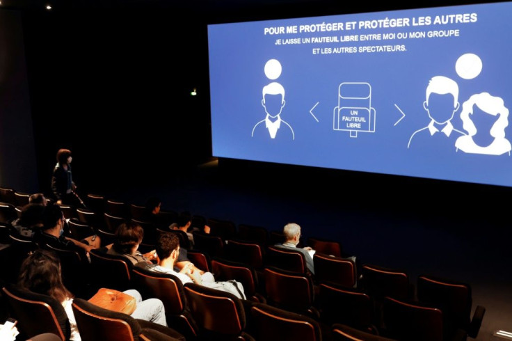 A Paris cinema reminds film lovers of its social distancing rules