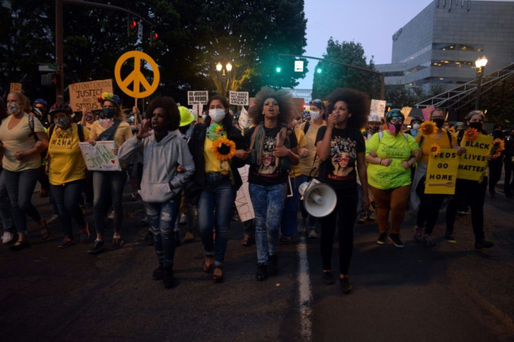 Demonstrators march to the federal courthouse in Portland -- to demonstrate against both racism in policing and the presence of federal law enforcements agents in the streets