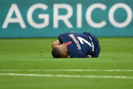 Kylian Mbappe was forced off after a clumsy tackle by Saint-Etienne defender Loic Perrin