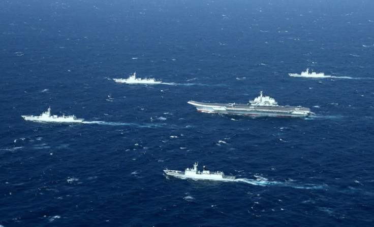 Chinese navy ships, including the aircraft carrier Liaoning, during military drills in the South China Sea