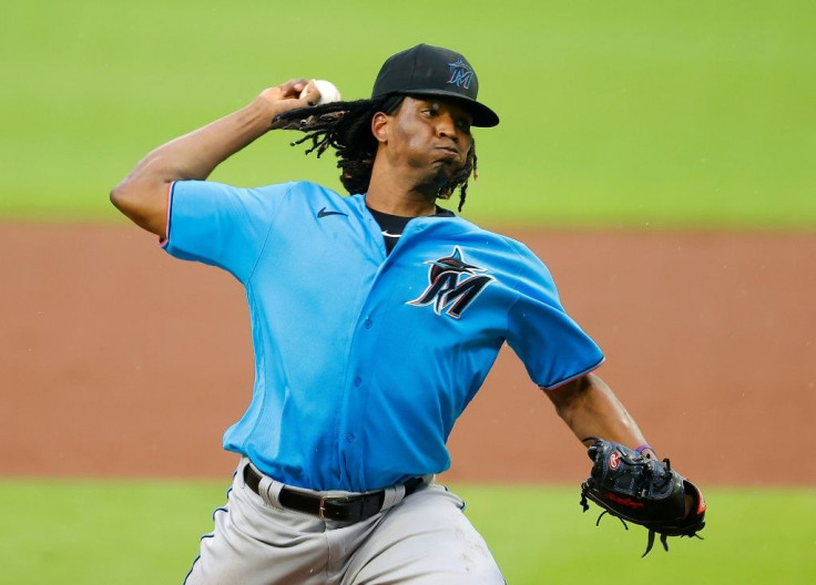 Miami pitcher Jose Urena is one of 14 Marlins playing and coaching staff who have reportedly tested positive for COVID-19