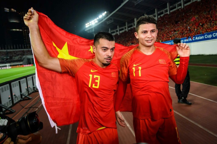 Brazil-born Elkeson (R) has played four games for China, scoring three goals