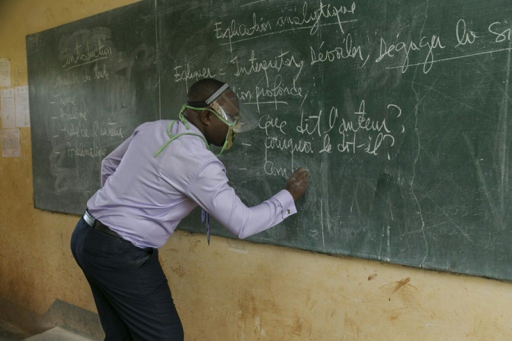 Protection: A teacher wears a face shield at the Nkol-Bisson Technical High School in Yaounde