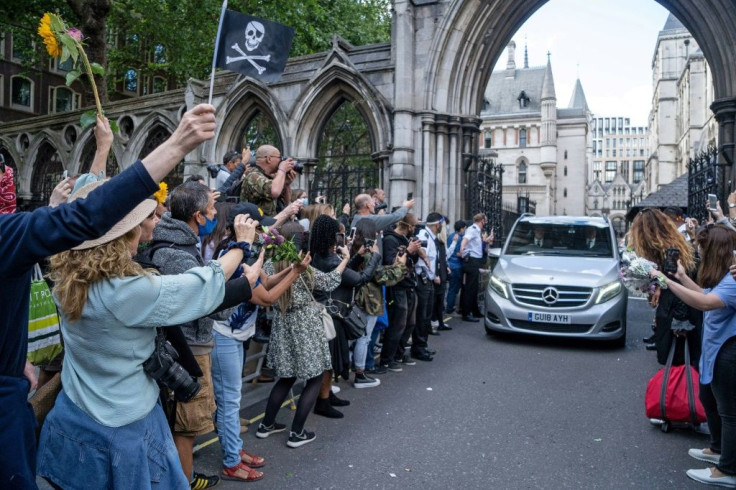 The "Pirates of the Caribbean" franchise hero was mobbed by fans chanting "Justice for Johnny" and trying to pass him bouquets