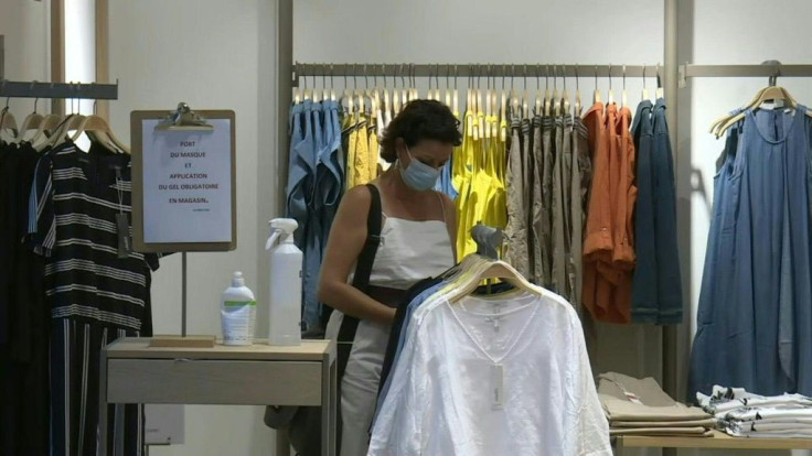 IMAGES Geneva residents wear masks in shops as face coverings become compulsory in all shops across the canton of Geneva. The measure had already been implemented in other Swiss cantons.