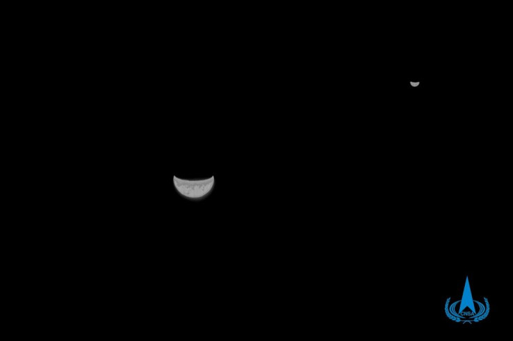 A view of the Earth and Moon taken by China's Tianwen-1 Mars probe from a distance of 1.2 million kilometers