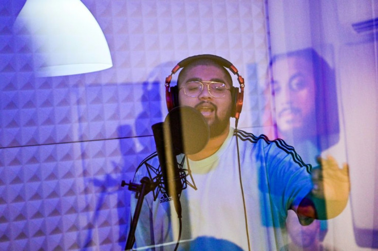 Emirati rapper Saud Waled Ibrahim, better known as SG, records a track in his studio in Ajman in the United Arab Emirates
