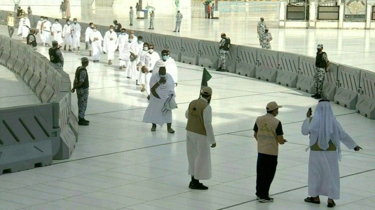 IMAGES The first groups of Muslim pilgrims arrive to Mecca's Kaaba as they begin the annual hajj, dramatically downsized this year as the Saudi hosts strive to prevent a coronavirus outbreak during the five-day pilgrimage.