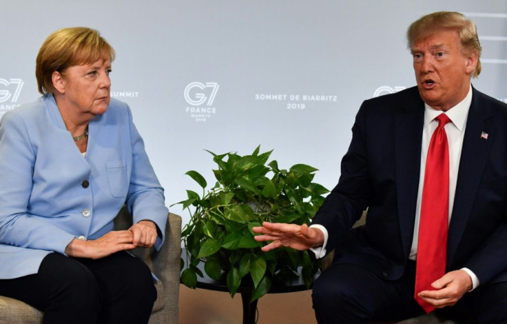 The US decision to slash troops in Germany comes amid a rift over politics and trade between German Chancellor Angela Merkel (L) and US President Donald Trump