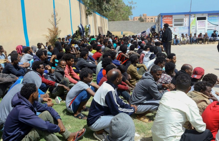 Tens of thousands of refugees and asylum-seekers -- similar to these African migrants who fled Libyan battle zones, pictured April 2019 at at a detention center in Zawiya -- have been stranded in chaos-wracked Libya