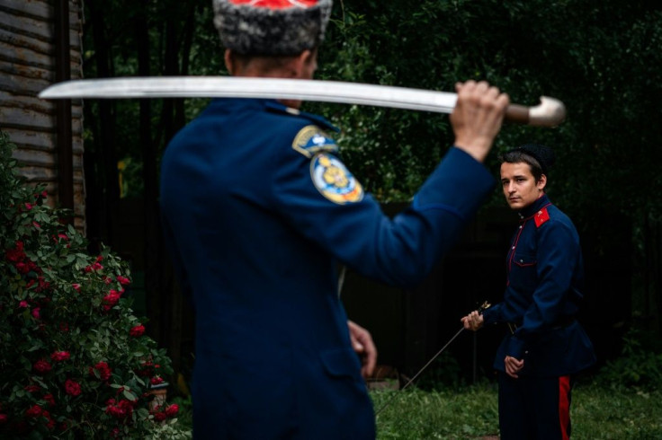 Snezhana Golubeva and her sonÂ go twice a week to workshops led by Cossacks, who once guarded the southern frontiers of tsarist Russia