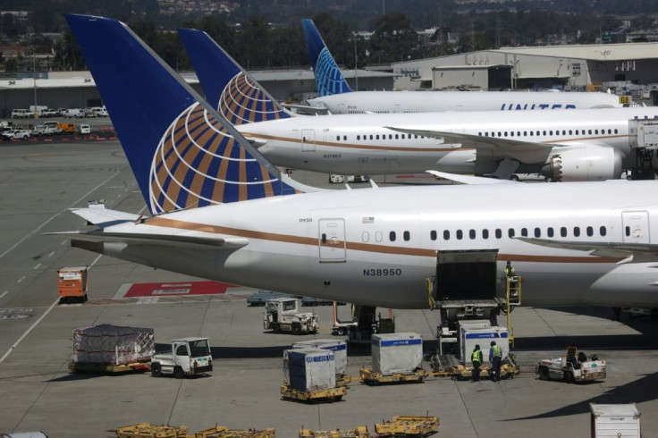 United Airlines warns of even deeper layoffs than previously discussed because of weakening demand due to the latest coronavirus spike