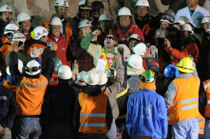 In this file photo taken on October 13, 2010, Chilean miner Mario Sepulveda (C with sunglasses) celebrates after being brought to the surface