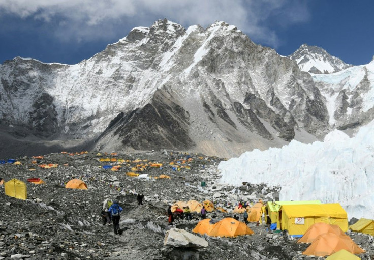 Tent cities grow at the foot of Everest and other peaks in the climbing seasons, with climbers and support staff all living in close quarters