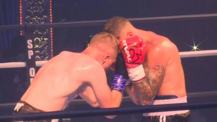 About 750 people watch a professional boxing fight in Paris, the first one to be held since March 7 after the outbreak of COVID-19. The number of spectators was limited and wearing a mask compulsory.