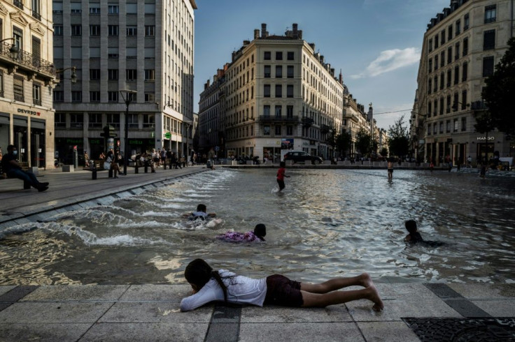 Children cooled off in a fountain in Lyon