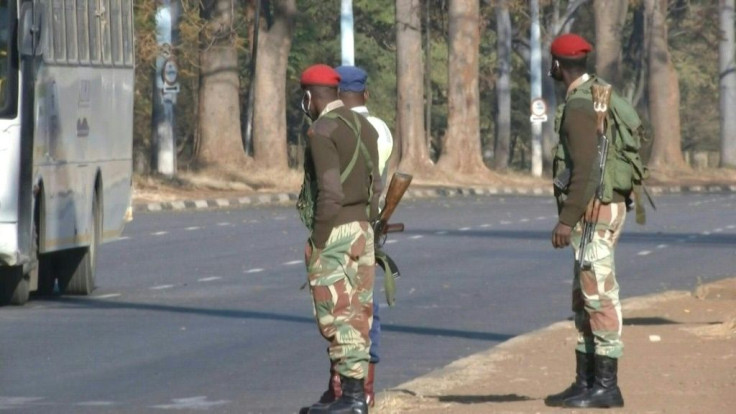 IMAGES The streets of central Harare are empty, as soldiers and police patrol to enforce a ban on protests. Demonstrators had been set to take to the streets to protest against alleged state corruption and the deteriorating economy.