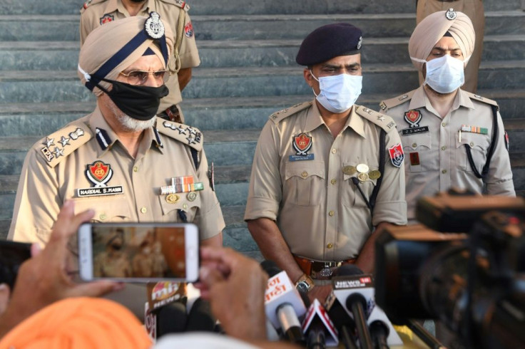 Dozens of people died after drinking toxic bootleg alcohol in northern India's Punjab state