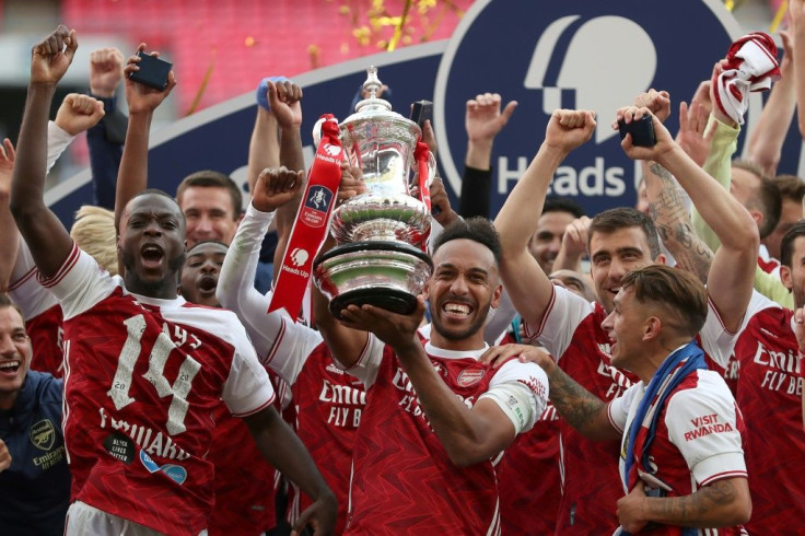 Pierre-Emerick Aubameyang lifts the FA Cup after scoring twice against Chelsea